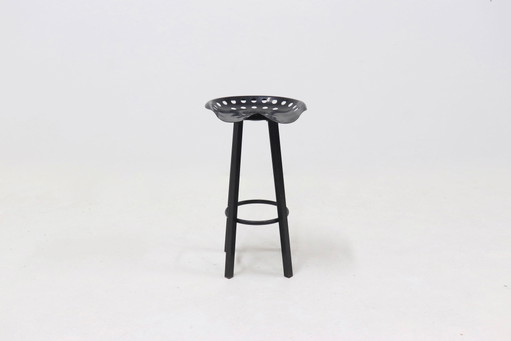 Tabouret vintage à siège de tracteur