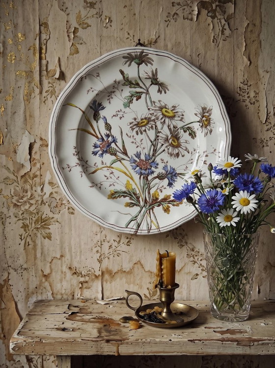 Image 1 of Antique Longchamp deep dish with polychrome ironstone daisies