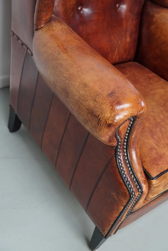 Image 1 of Vintage Nederlandse clubfauteuil in cognackleurig leer