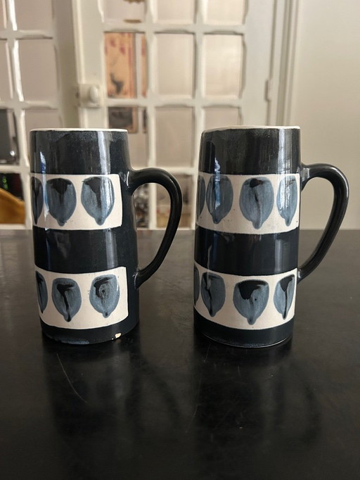 two vintage ceramic mugs