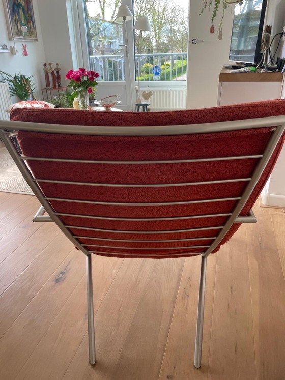 Image 1 of 2 Harvink fauteuils frame titaan bekleding Brique kleur