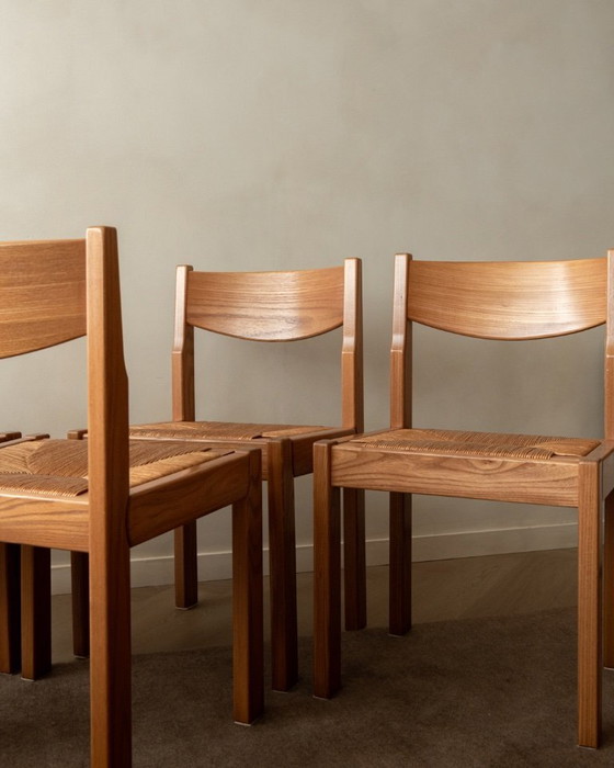 Image 1 of Mid-century eetkamerstoelen van iepenhout en riet van Maison Regain, jaren 70, set van 4