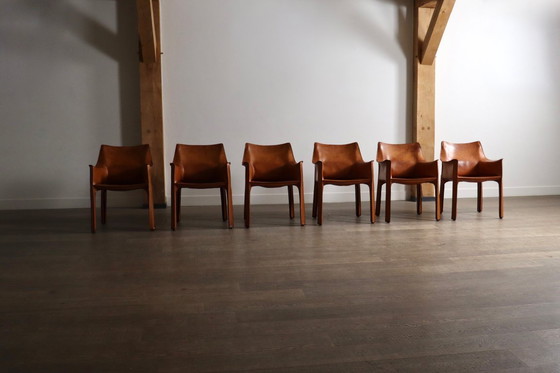 Image 1 of 6er-Set Cassina CAB Esszimmerstühle mit Armlehnen in cognacfarbenem Leder von Mario Bellini, Italien, 1970er Jahre