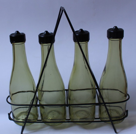 Image 1 of Botellas para aderezo de ensaladas y aceite.