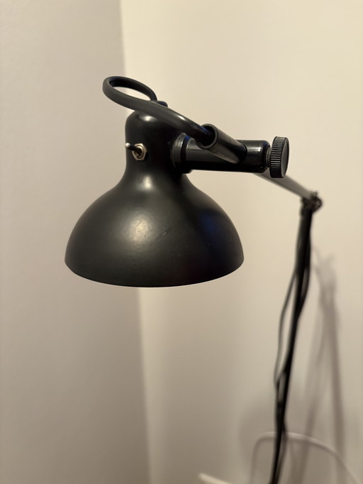 Black metal reading lamp