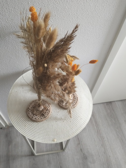 Kunstwer van droogbloemen 