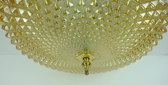 Image 1 of mid century ceiling LAMP flush mount textured amber glass and brass 1970s
