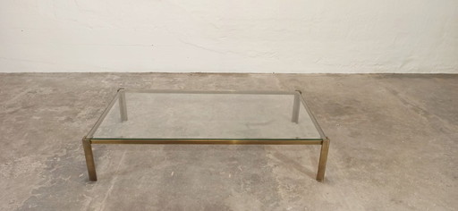 table basse vintage en verre et cadre couleur laiton