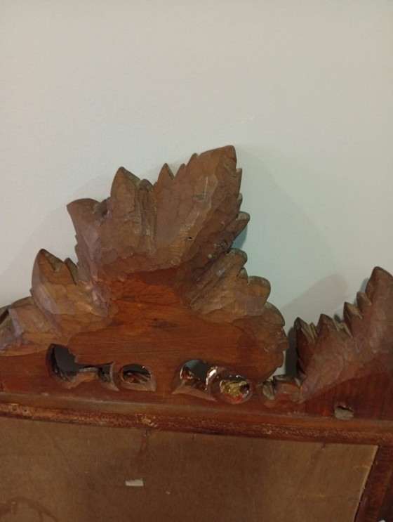 Image 1 of Belangrijke en spectaculair gebeeldhouwde wijnkelderspiegel