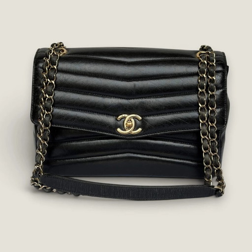 Chanel reversed chevron flap bag