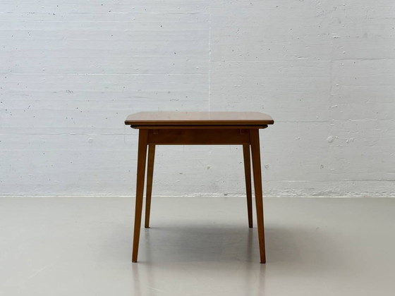 Image 1 of Uitschuifbare eettafel van kersenhout uit Willisau, Zwitserland, jaren 60.
