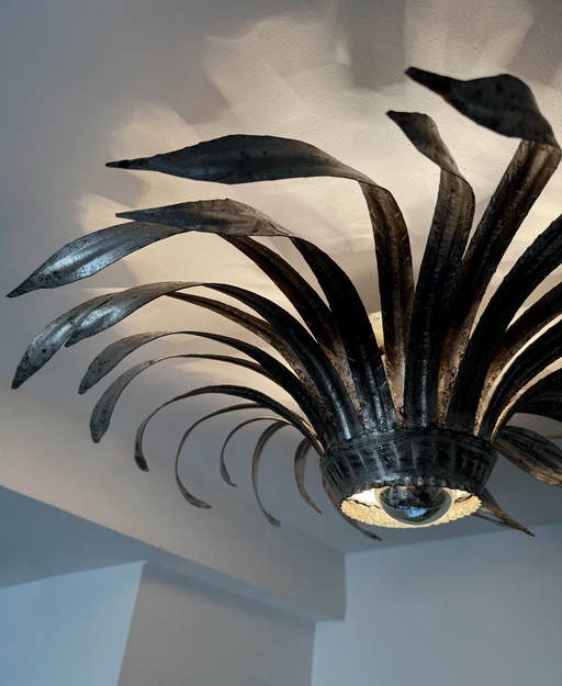 Sunburst wall sconce in silver wrought iron, 1960s