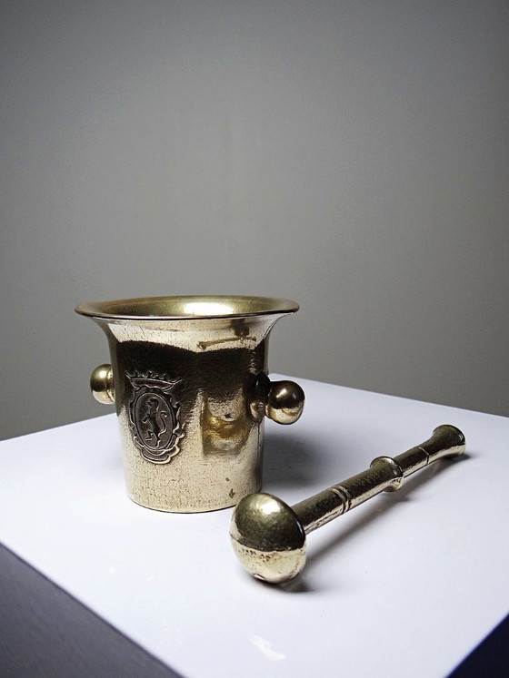 Image 1 of Gilt bronze apothecary's mortar and pestle with heraldic decoration, 20th century