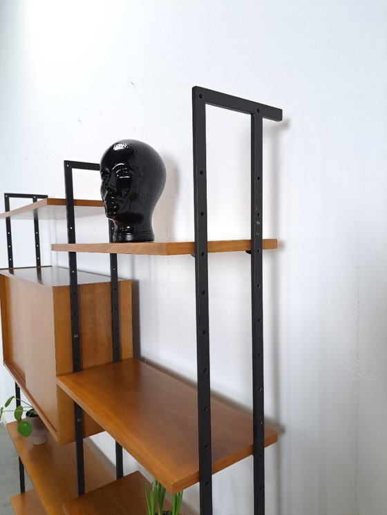 Image 1 of Parete componibile Omnia, Hilker, teak e acciaio nero con ripiani e mobiletto