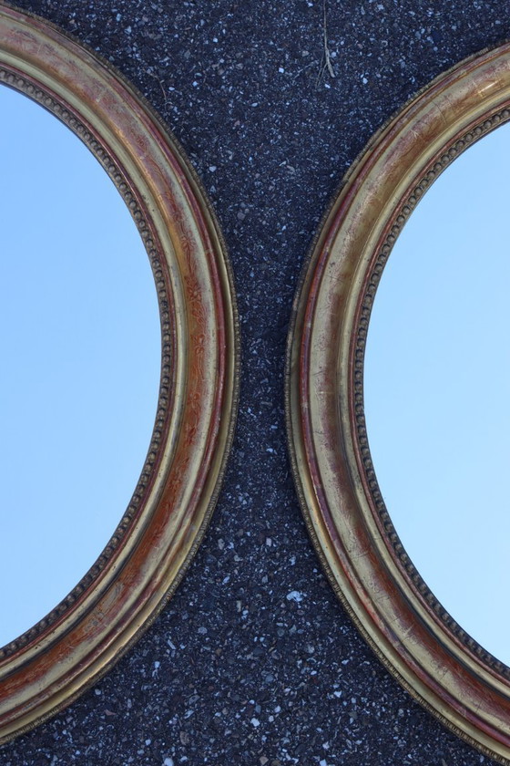 Image 1 of Pair of oval Louis Philippe period mirrors in giltwood