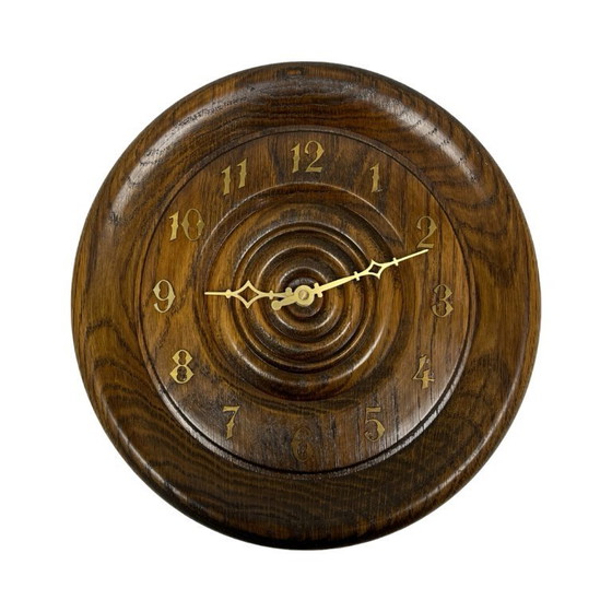 Image 1 of Vintage round oak wall clock carved turned wood retro Germany 1980s.