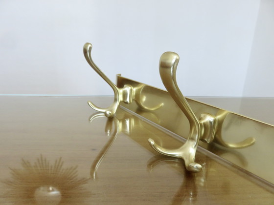 Image 1 of Large wall-mounted coat rack in gilded aluminum, France, 1970