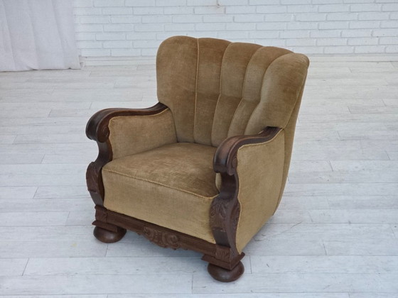 Image 1 of 1960s, Danish armchair, original green furniture velour, carved oak wood.