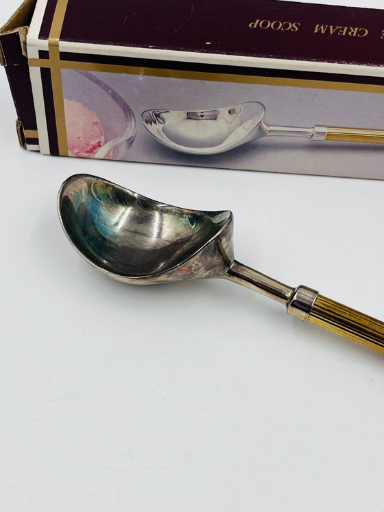 Image 1 of Cuchara para helado de diseño con mango dorado