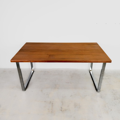 Solid teak table with chrome-plated frame