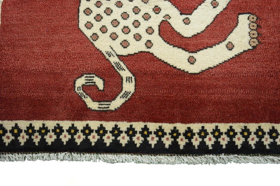 Image 1 of Hand-knotted nomadic rug with tiger motif - Shiraz 118 x 85 cm | Wool, red & beige