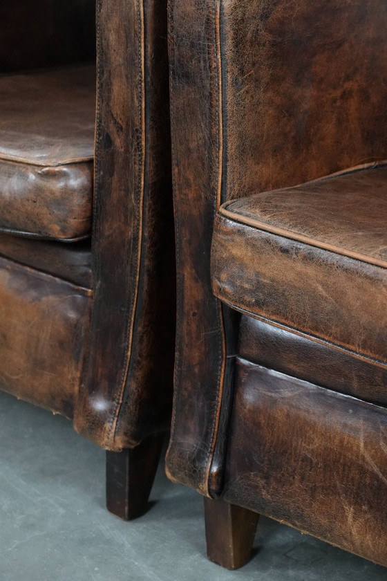 Image 1 of 2 eleganti poltrone di design in pelle di pecora con splendidi colori intensi e un design senza tempo