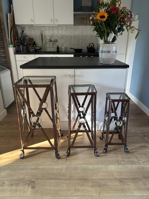 Unique set of 3 console tables – France, 1970s – in the style of Jacques Adnet – iron (imitation leather) and glass