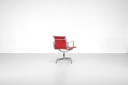 Red leather armchair "EA 108", designed by Charles Ray Eames for Vitra, USA 1969.