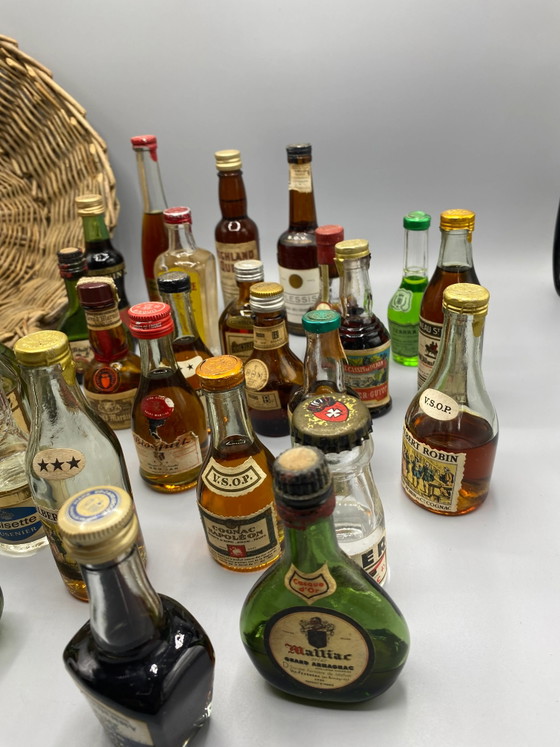 32 vintage miniature spirit bottles and large wicker basket – Decorative Objects, Glass, Mid Century Modern (photo 5 of 8)