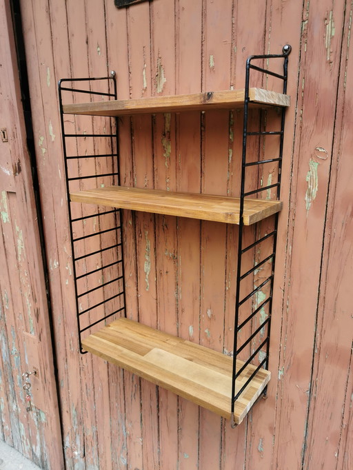 Strinning wall shelf