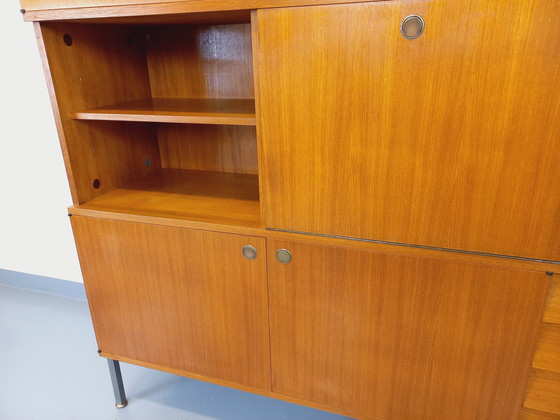 Image 1 of Louis Paolozzi's vintage modernist secretary bookcase for Monopoly in teak and metal from the 60s
