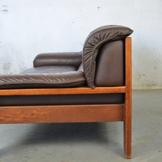 Image 1 of 1x 2 seat leather couch in wooden frame
