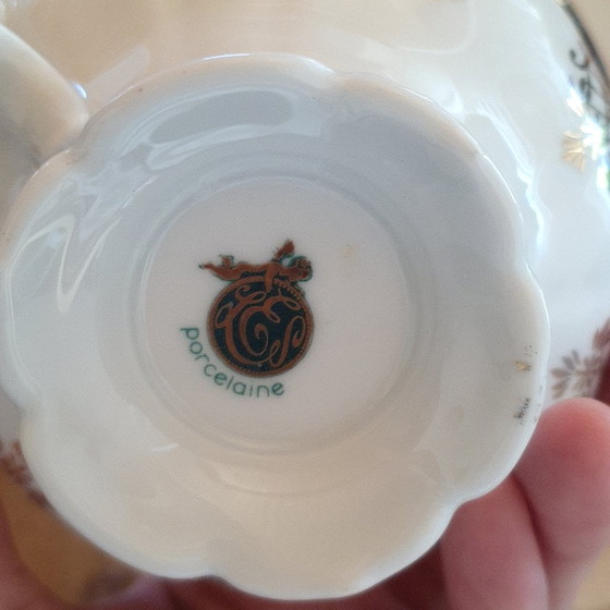 Tasse et soucoupe en porcelaine dorée – décor romantique – Accessoires de table (photo 4 of 5)