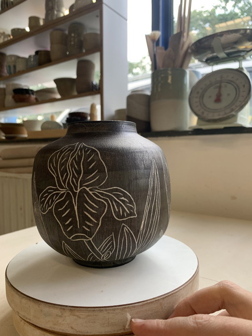 Handmade stoneware vase (ceramic) with irises and metallic glaze