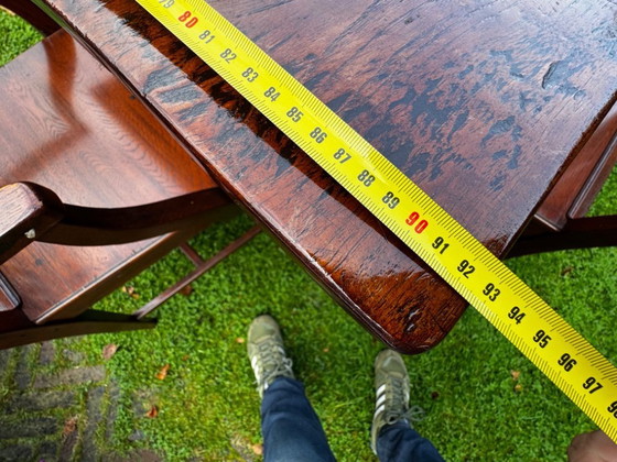 Image 1 of Grande table de salle à manger coloniale en teck massif avec 8 chaises et coussins