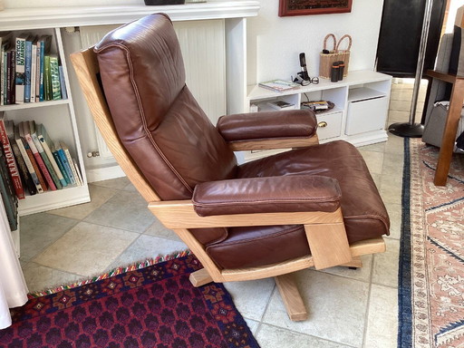 Fauteuil pivotant en cuir vintage
