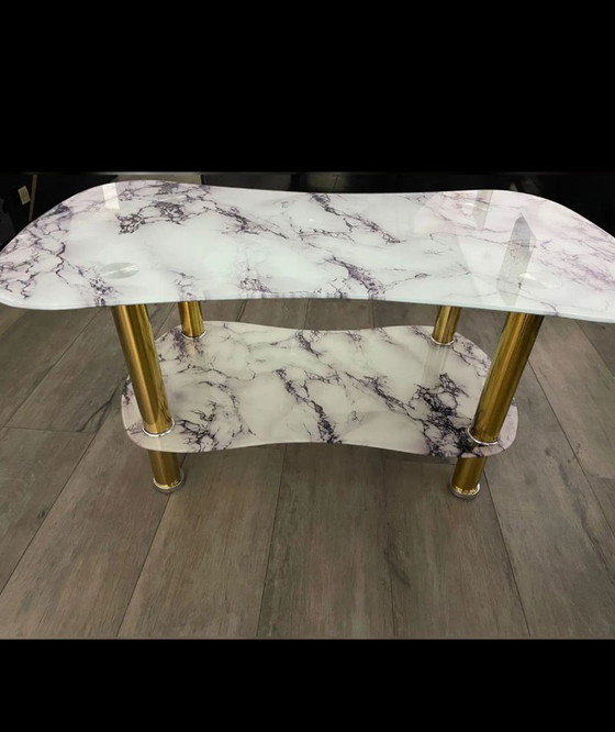 Image 1 of negen marmeren salontafels