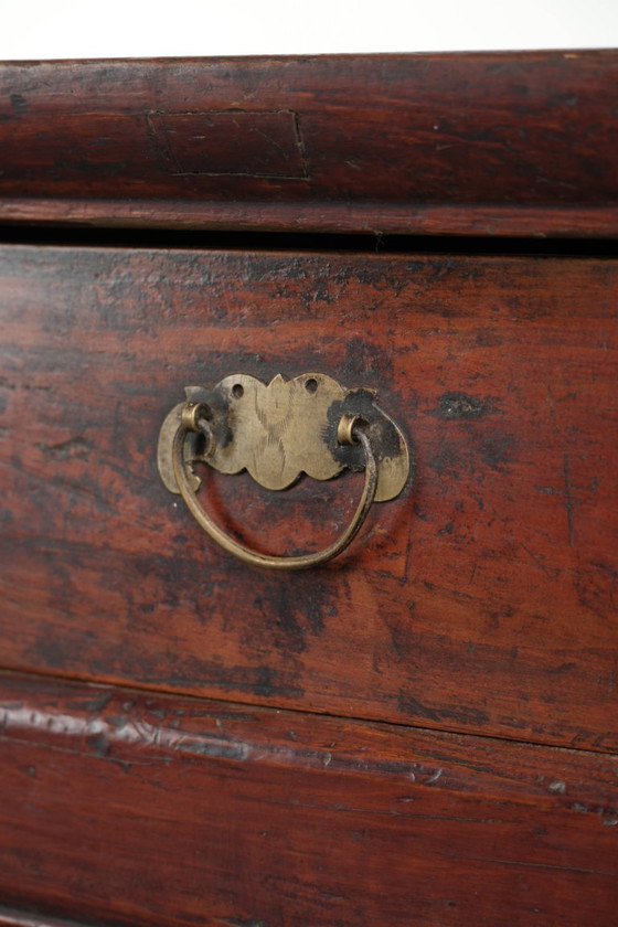 Image 1 of Antique wooden Chinese sideboard from the late 19th century in a beautiful red color with exquisite wood carving.