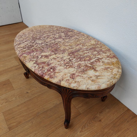 Image 1 of Vintage Oval Wooden coffee table with onyx marble top