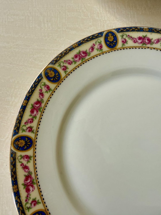 Image 1 of Set van 7 Limoges porseleinen borden, Frankrijk