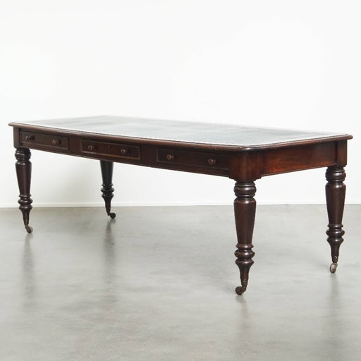 Antique English writing desk/ partner desk with blue leather top from mid 19th century