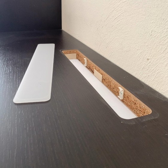 Image 1 of Sleek wall unit with hanging element ALPE