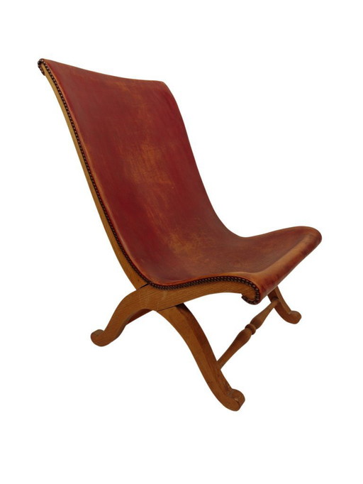 Slipper chair van rood leer van Pierre Lottier voor Valenti
