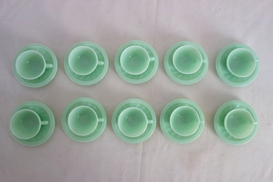 Image 1 of 10 almond green opaline cups and saucers from the 50s