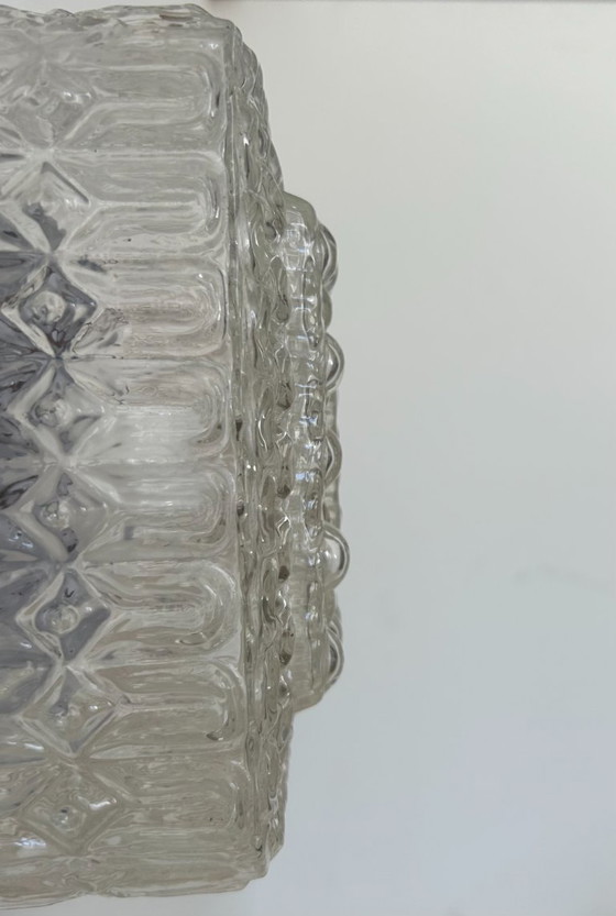 Image 1 of Een paar vintage wandlampen, metaal en geperst glas, Frankrijk, 1970