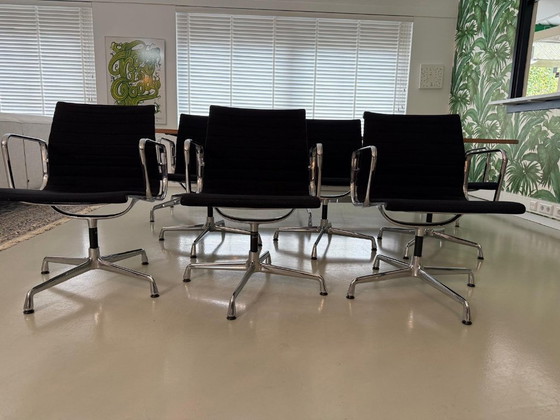 Image 1 of Vergader set Eames: Segmented table + 6 stoelen EA108