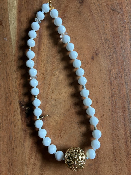 New short necklace with white vintage beads and gold-colored ornament 42 cm