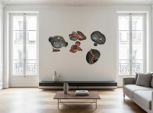 Set of brutalist wall sculptures signed B + D, circa 1965–1975