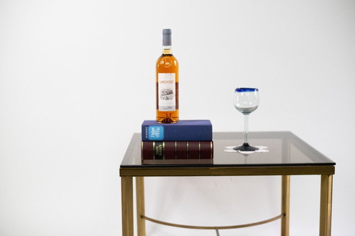 Elegante salontafel met blad van gerookt glas