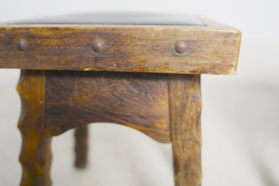 Image 1 of Rustic Oak Stools, 1940s French Hand-Carved Farmhouse Milking Stools, Fireplace Chalet Mountain Decor with Studded Leather Seats